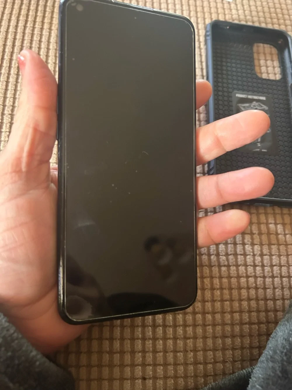 Motorola Black Phone with Blue Logo Display for metro pcs.
